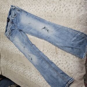 Distressed Blue Denim Jeans